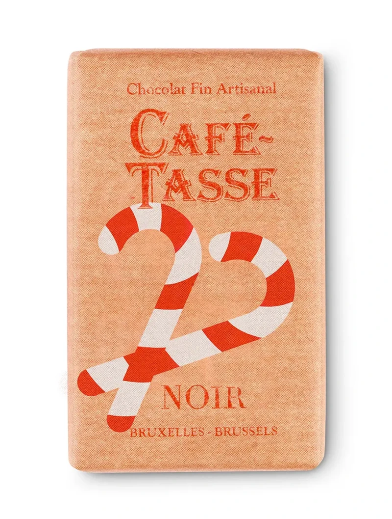 Mini tablette de chocolat noir Café-Tassé, édition de Noël, emballage orange orné d'une canne à sucre rouge et blanche avec la mention « Noir Bruxelles - Brussels ».