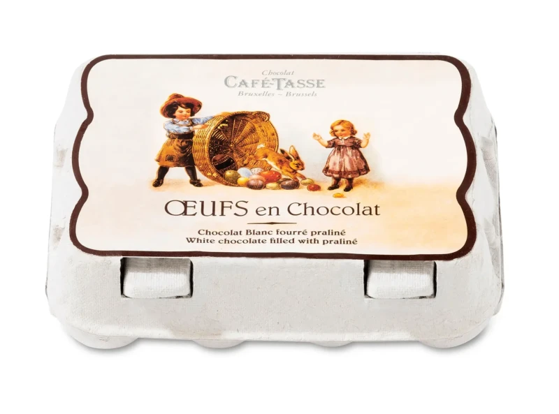 Boîte façon plateau à œufs Café-Tassé, illustration vintage d'enfants et lapin, « Œufs en Chocolat, Chocolat Blanc fourré praliné / White chocolate filled with praliné ».