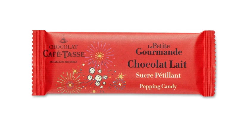 Emballage rouge illustré de feux d'artifice, « Chocolat Café-Tassé », « La Petite Gourmande » Chocolat Lait Sucre Pétillant, mention « Popping Candy ».